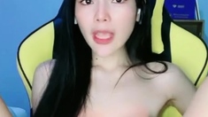 Emma - Thai babe fucks dildo