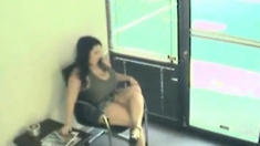 Couple filmed by a security cam in a waiting room