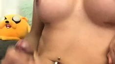 Tranny with big tits tugs on her big cock